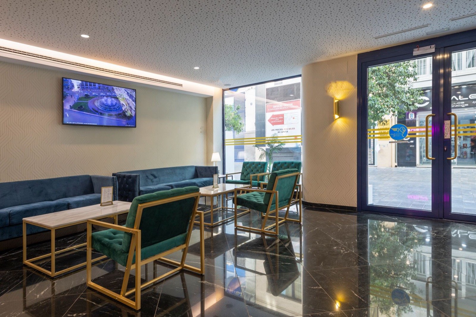 Zona de estar del vestíbulo del Hotel Venecia Plaza Centro